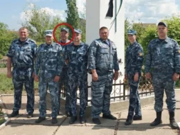 Russian prison guard Nikita Pushkarev circled in group photo of correctional colony No. 12 staff in Kamensk-Shakhtinsky, Rostov Oblast