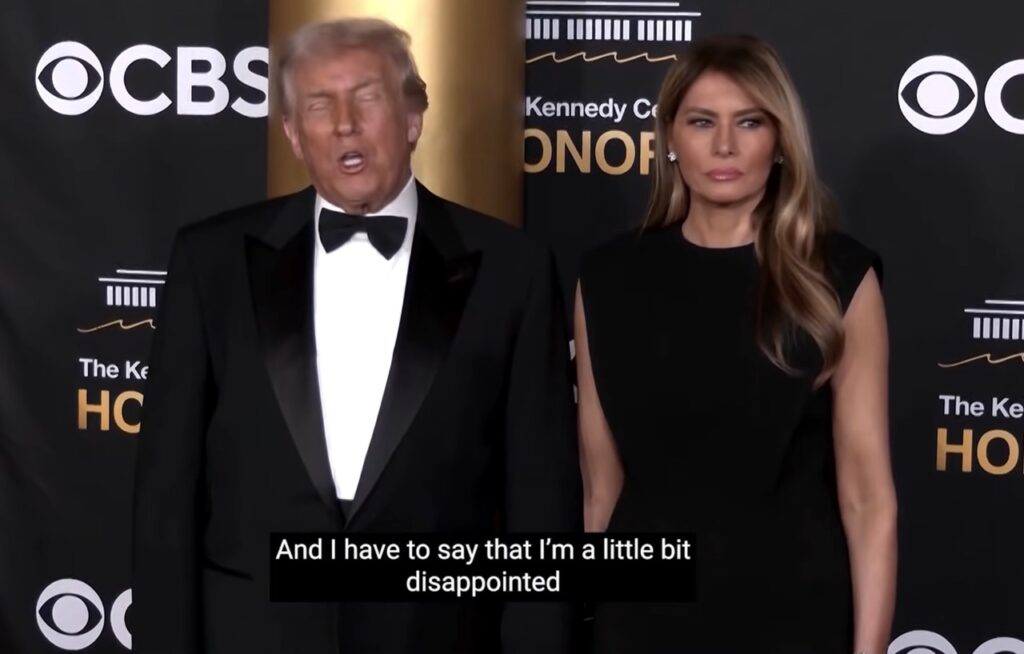 Donald Trump in a tuxedo speaks to reporters at the Kennedy Center Honors, with subtitles reading "And I have to say that I'm a little bit disappointed"
