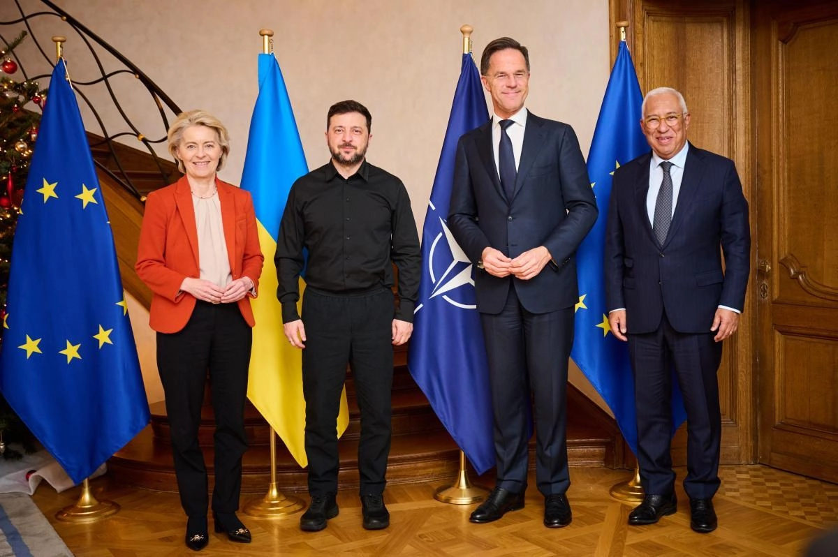 European Commission President Ursula von der Leyen, Ukrainian President Volodymyr Zelenskyy, NATO Secretary General Mark Rutte, and European Council President António Costa standing together at EU-Ukraine meeting, 8 December 2025