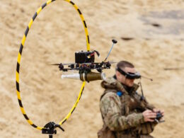 A Ukrainian soldier is training how to operate a small drone carrying a munition. Courtesy: SBS