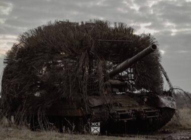 ukraine's 92nd assault brigade captures russian porcupine tank wrapped mesh cables (photos) · post captured t-80bvm fitted anti-drone cage camouflage shown open field 5418392722319544787 ukraine news ukrainian reports