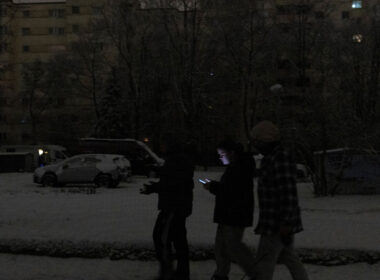 russia targeting germany already — berlin believes worse coming · post people walk through darkened residential area southwest during major power outage 4 2026 blackout affecting tens thousands households businesses