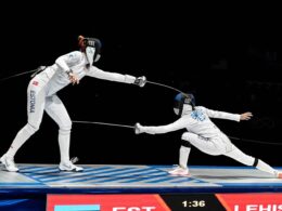 Two Estonian fencers face off in an epee bout at an international competition