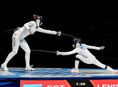Two Estonian fencers face off in an epee bout at an international competition