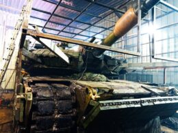 A 1st Assault Regiment M-1 getting add-on armor.