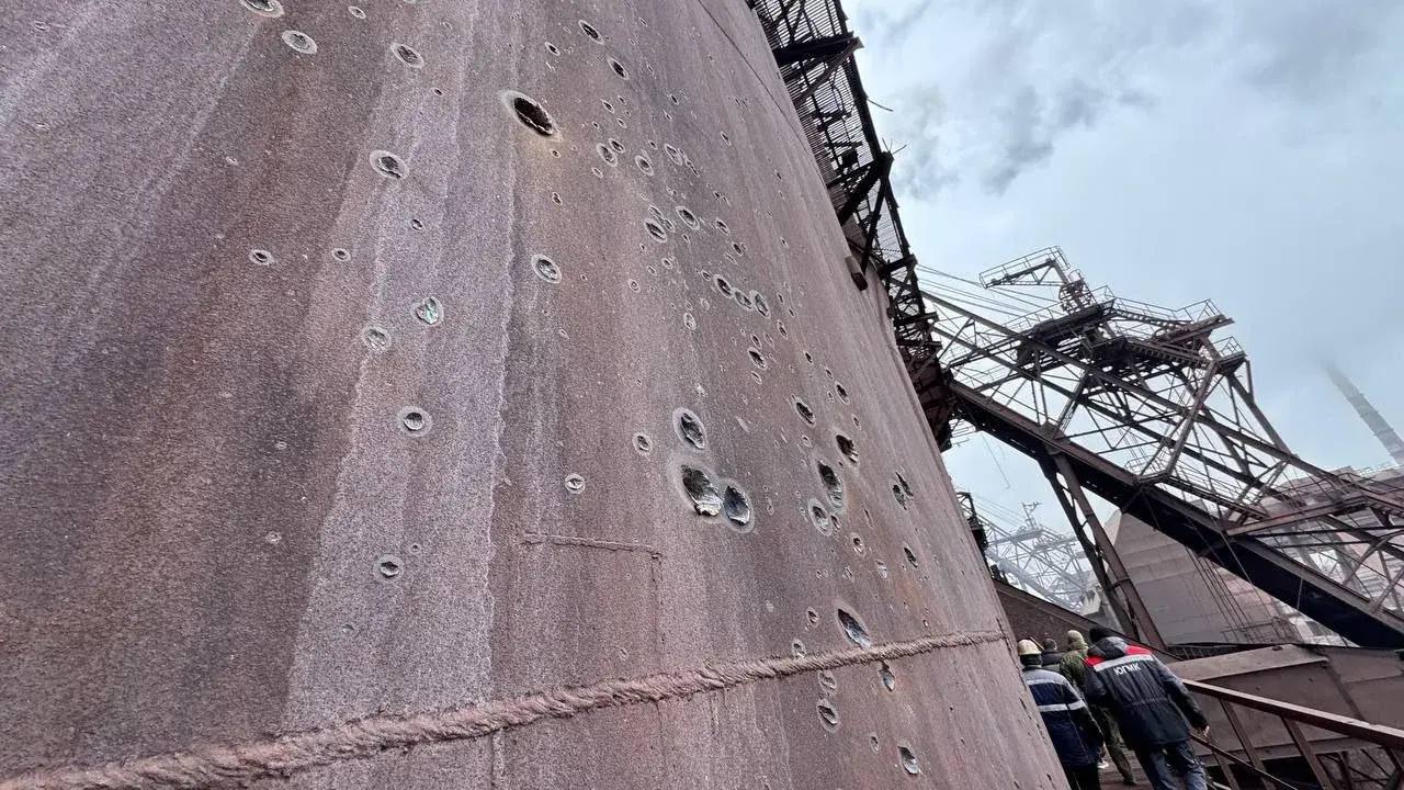 62d3fc8d-af94-4519-a0f7-3418e72f0374 russia orders shell casings steel plant occupied alchevsk ukraine's drones struck again overnight · post shrapnel impact marks industrial structure metallurgical luhansk oblast following ukrainian drone strike 20 2026 62d3fc8d-af94-4519-a0f7-3418e72f0374