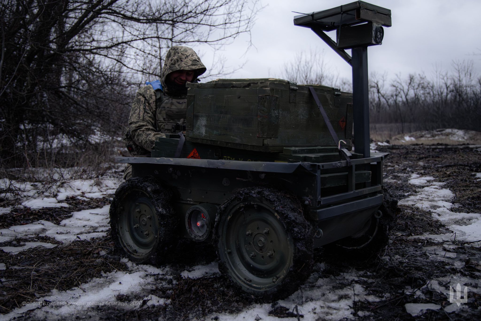 A Ukrainian soldier is loading a ground robotic system. Source: The General Staff