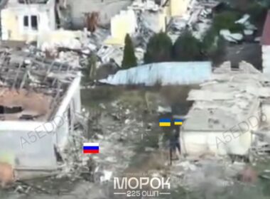 how fpv drones saved two ukrainian pows isolate strike evacuate · post drone view shows moment before rescue operation — russian soldier (marked flag) flags) destroyed settlement zaporizhzhia oblast capture
