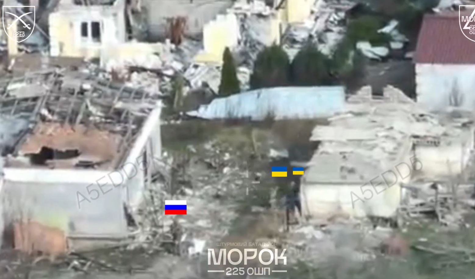 how fpv drones saved two ukrainian pows isolate strike evacuate · post drone view shows moment before rescue operation — russian soldier (marked flag) flags) destroyed settlement zaporizhzhia oblast capture