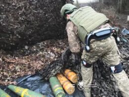 gunners can carry small car's weight shells every day — ukraine fields exoskeletons pokrovsk front · post artilleryman 147th separate artillery brigade wearing exoskeleton picks up combat position direction 2026