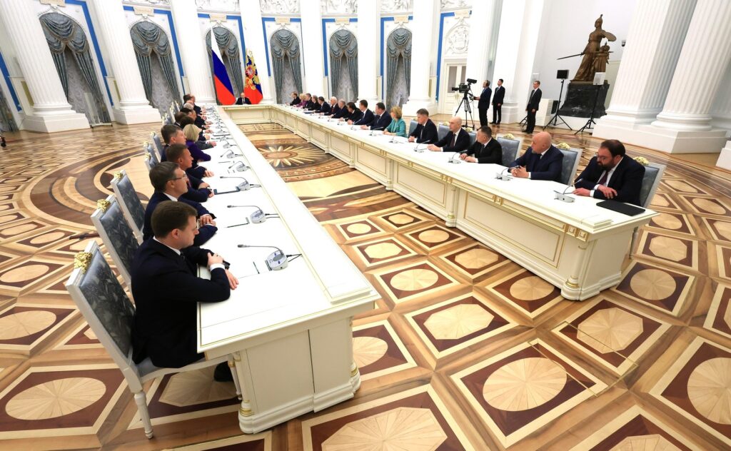 putin with the russian cabinet in kremlin