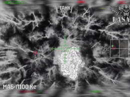 Ukrainian strike on a Russian tank hiding in a forest in Belgorod Oblast, as seen from a drone. Screenshot from video: Lasar's Group