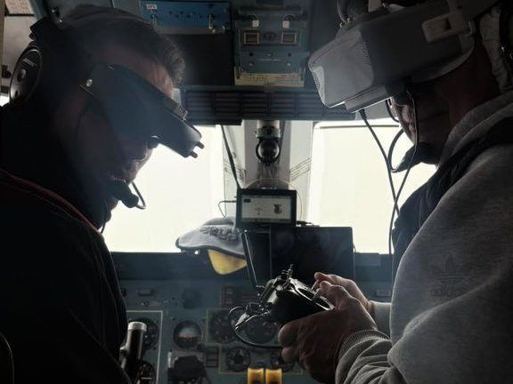 An-28 crew with VR drone-control goggles.
