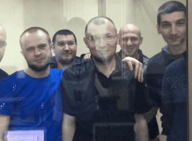 Crimean political prisoners in court in 2019: the front from left - Muslim Aliev, Vadim Siruk, Emir-Usein Kuku, Refat Alimov, at the back, from left - Envir Bekirov, Arsen Dzhepparov. All of them (except for Dzhepparov and Alimov) are still in custody as of today. Photo: Crimean Solidarity