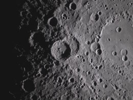 The image from the Artemis II crew, showing the Orientale basin on the right edge of the lunar disk. NASA