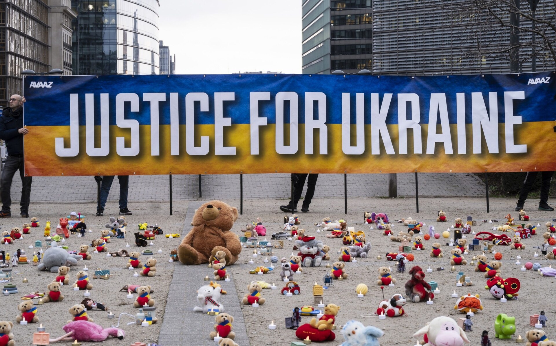 iceland poland tip special tribunal russia's aggression 17 — minimum needed formal vote · post teddy bears candles laid out us-based nonprofit avaaz schuman roundabout brussels vigil ukrainian children deported