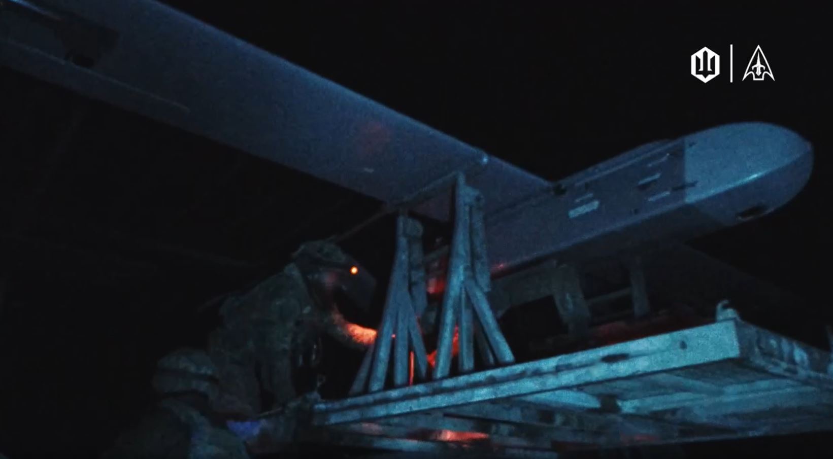 ukraine building bigger deep-strike drone machine — middle- operations both scaling up more units · post ukrainian soldier prepares fixed-wing long-range strike launch night ukraine's unmanned systems forces (sbs) world's