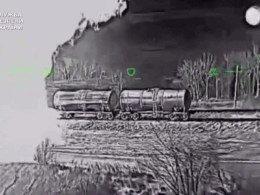 SBU Ukrainian drone strikes Luhansk Oblast Russian fuel tanker seen by a Ukrainian drone, with others on fire from previous strikes nearby.