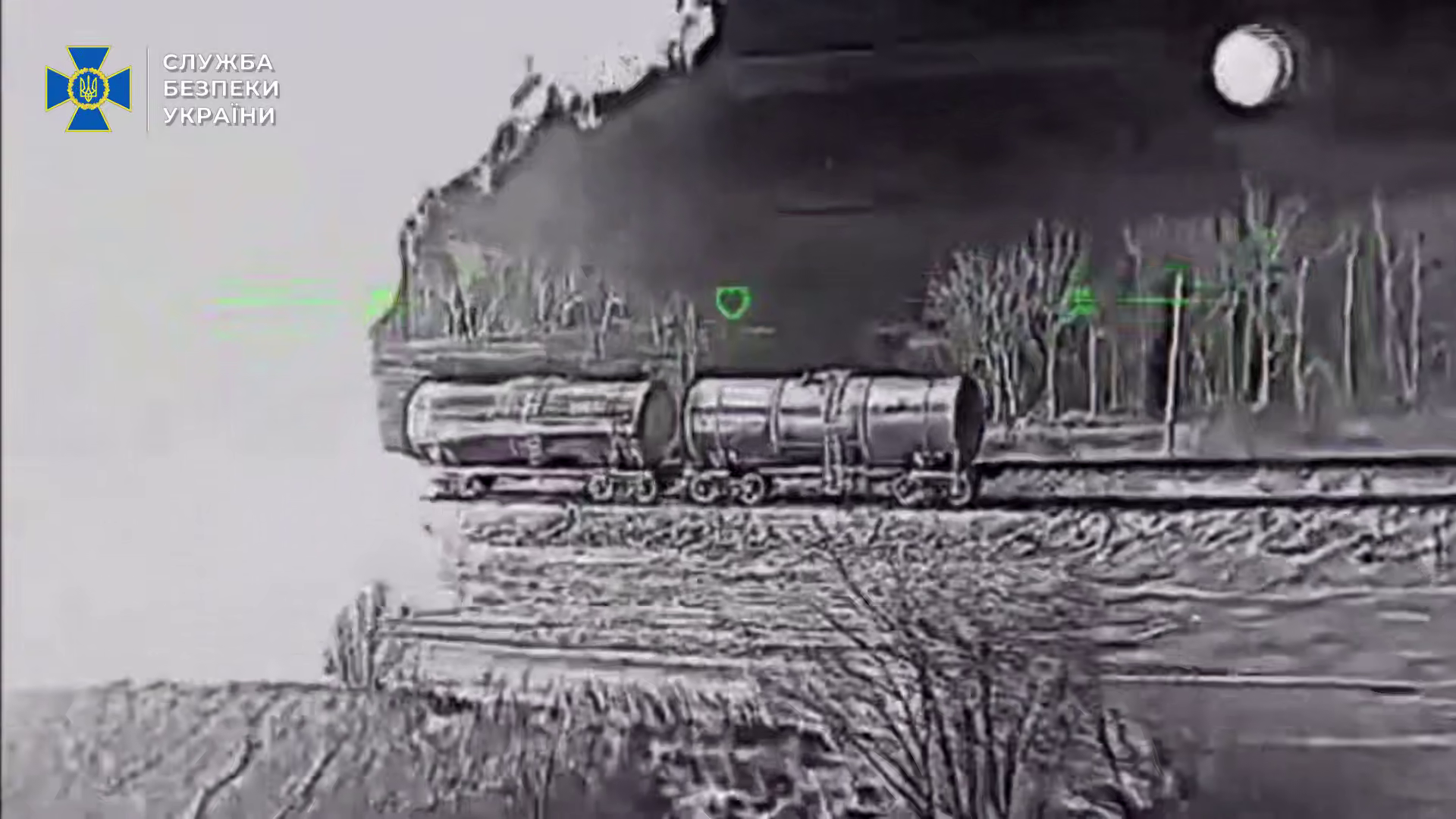 SBU Ukrainian drone strikes Luhansk Oblast Russian fuel tanker seen by a Ukrainian drone, with others on fire from previous strikes nearby.