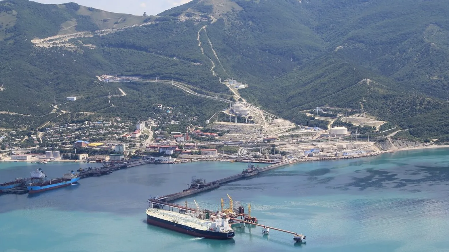kyiv confirms hit sheskharis be-12 same overnight operation — black sea oil hub crimea-based anti-submarine aircraft one strike package · post terminal novorossiysk krasnodar krai russia before attack tanker loading