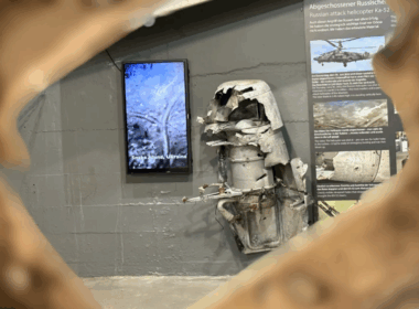 Front: parts of a stealth unmanned aerial vehicle S-70. Back: parts of a downed Russian Ka-52 helicopter. Source: berlinstory.de