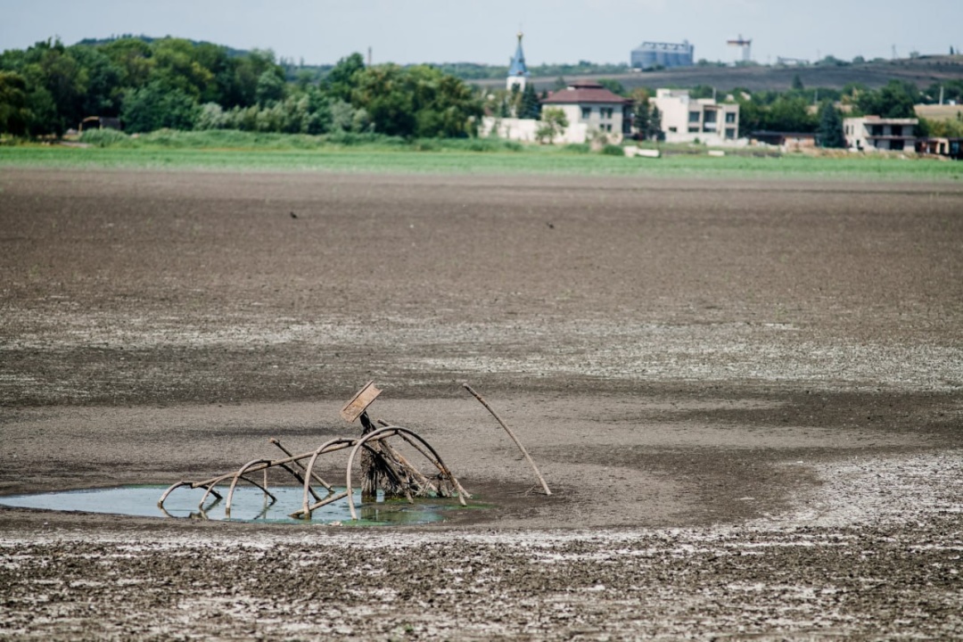 occupied donetsk's drinking water crisis so bad russia now proposing heavy-metal-laced drainage substitute · post dried-out bed khanzhenkovske reservoir krynka river donetsk oblast which ceased exist body 2025 ханжонківське водосховище