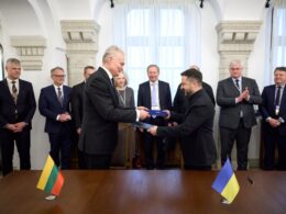 lithuania signs full drone deal latvia receives ukrainian air defense experts · post lithuanian president gitanas nausėda (left) volodymyr zelenskyy exchange signed agreement copies bucharest nine summit 13 2026 presidentgovua