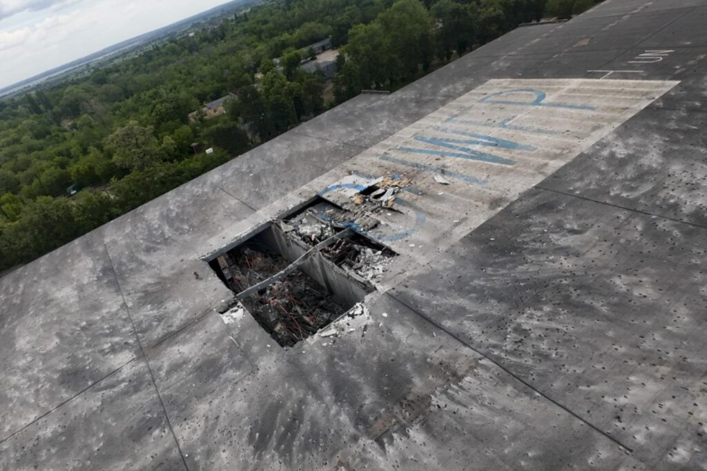 Hole in roof of UN WFA warehouse housing humanitarian aid in Dnipro, following Russian Iskander strike, 25 May. Photo: UN WFA