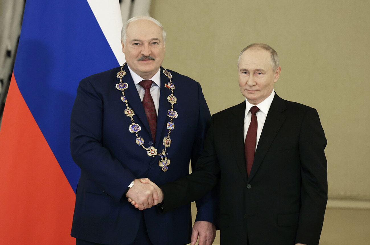 france's macron warned lukashenka drag belarus russia's war · post belarusian ruler alyaksandr (left) after receiving order st andrew first-called dictator vladimir putin (right) moscow 9 2024 presidentgovby lukashenka-left-after-receiving-the-so-called--орденом-святого-апостола-андрея-первозванного-from-putin-right-in--moscow-on-9-oct-2024 ukraine