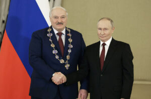 france's macron warned lukashenka drag belarus russia's war · post belarusian ruler alyaksandr (left) after receiving order st andrew first-called dictator vladimir putin (right) moscow 9 2024 presidentgovby lukashenka-left-after-receiving-the-so-called--орденом-святого-апостола-андрея-первозванного-from-putin-right-in--moscow-on-9-oct-2024 ukraine