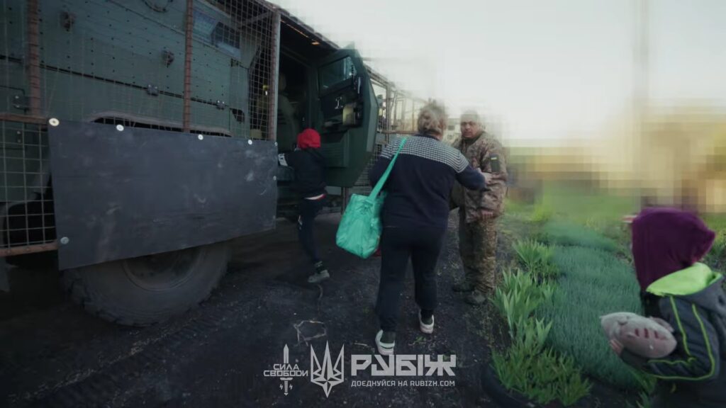 A scene showing the evacuation of orphans and their grandmother. Photo: A screenshot from a video by the "Rubizh" team