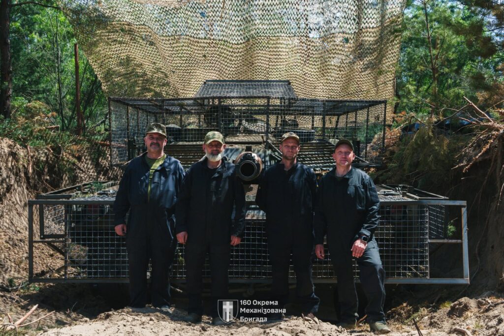 Ukrainian Abrams tank fitted with modular cage-style protection designed to counter FPV drone strikes on the front line, as crews adapt Western armor to modern battlefield threats. Photo: Ukraine’s 160th Separate Mechanized Brigade