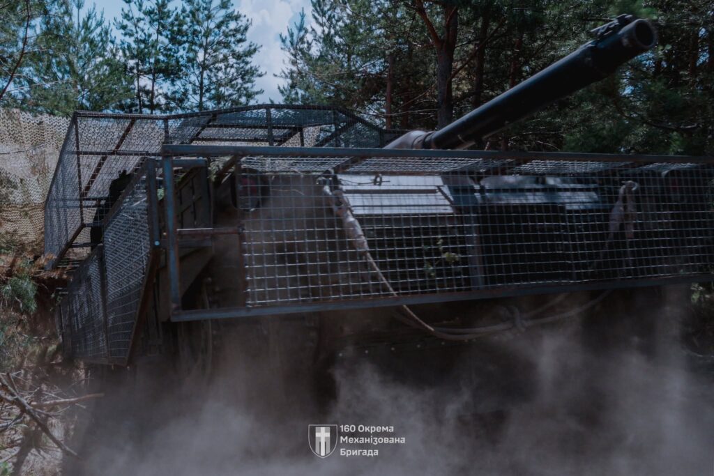 Ukrainian Abrams tank fitted with modular cage-style protection designed to counter FPV drone strikes on the front line, as crews adapt Western armor to modern battlefield threats. Photo: Ukraine’s 160th Separate Mechanized Brigade