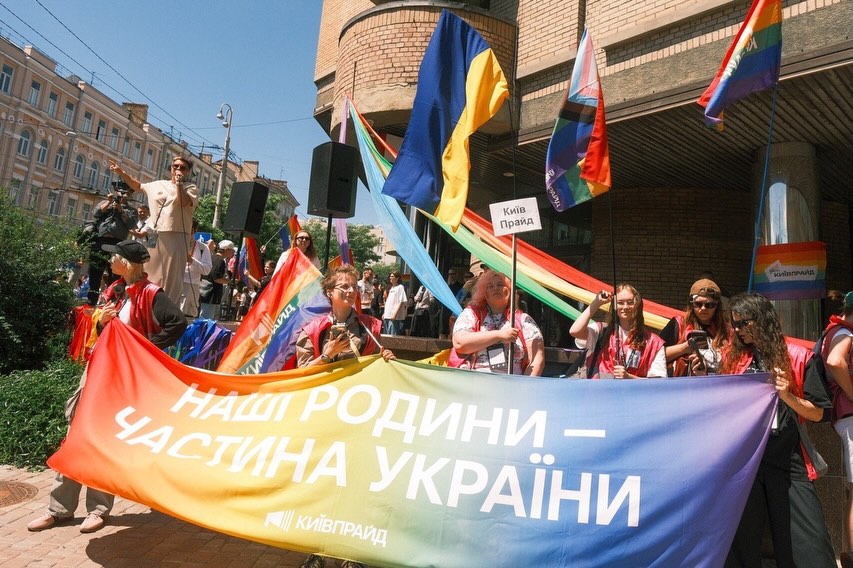 Banner reads: “Our families are part of Ukraine.” Participants take part in the KyivPride march in central Kyiv on 21 June, 2026. Photo: KyivPride