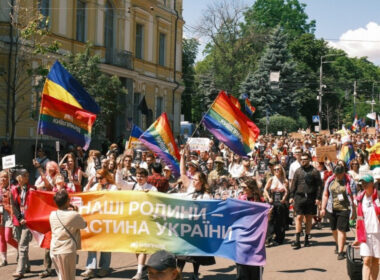 Banner reads: “Our families are part of Ukraine.” Participants take part in the KyivPride march in central Kyiv on 21 June, 2026. Photo: KyivPride