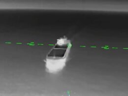An FP-1 barrels toward a Russian ship.