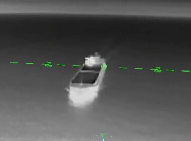 An FP-1 barrels toward a Russian ship.