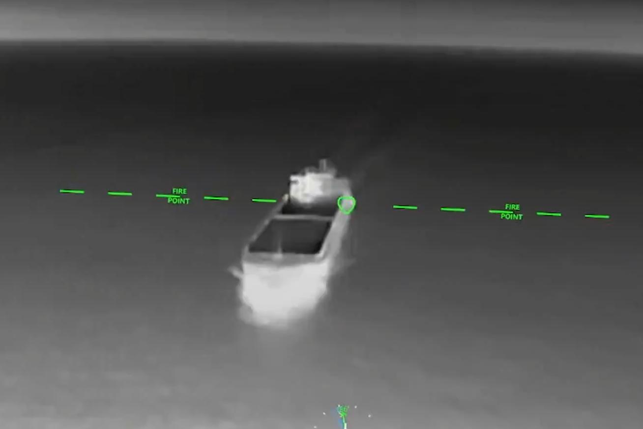 An FP-1 barrels toward a Russian ship.