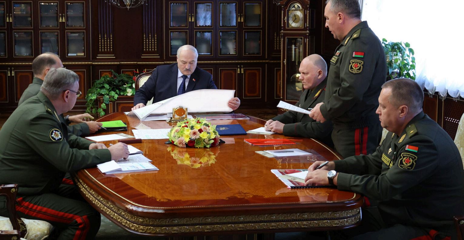 belarus's exiled opposition hands ukraine 30-page file how minsk being readied war · post belarusian ruler alyaksandr lukashenka (the only person civilian clothing center) chairs meeting military security surrounded uniformed