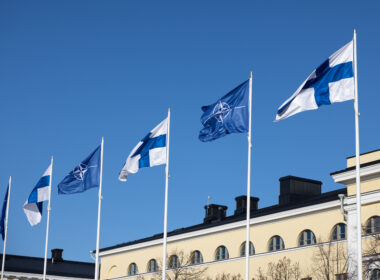 Flags of Finland and NATO. Photo via Wikimedia Commons