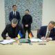 Ukrainian Defense Minister Mykhailo Fedorov and German Federal Defense Minister Boris Pistorius signing agreements on the development of anti-ballistic capabilities and the joint production of UGVs, in Brussels, 18 June 2026. Photo: Ukrainian President's Office