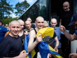 Ukrainian service members arrive home after release from Russian captivity in the 76th prisoner exchange, 26 June 2026. Photo: Zelenskyy