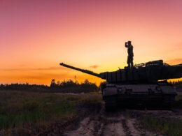 A Ukrainian soldier standing on a tank. Source: The 5th Separate Heavy Mechanized Brigade