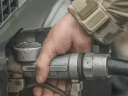A Ukrainian soldier refuels a vehicle with gasoline. Source: ArmyInform