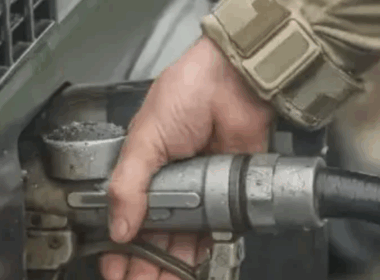 A Ukrainian soldier refuels a vehicle with gasoline. Source: ArmyInform