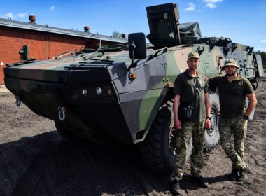 Ukrainian soldiers are standing next to Rosomak APCs at a Polish military base. Credit: Ukraine's 146th Separate Repair-Restoration Regiment