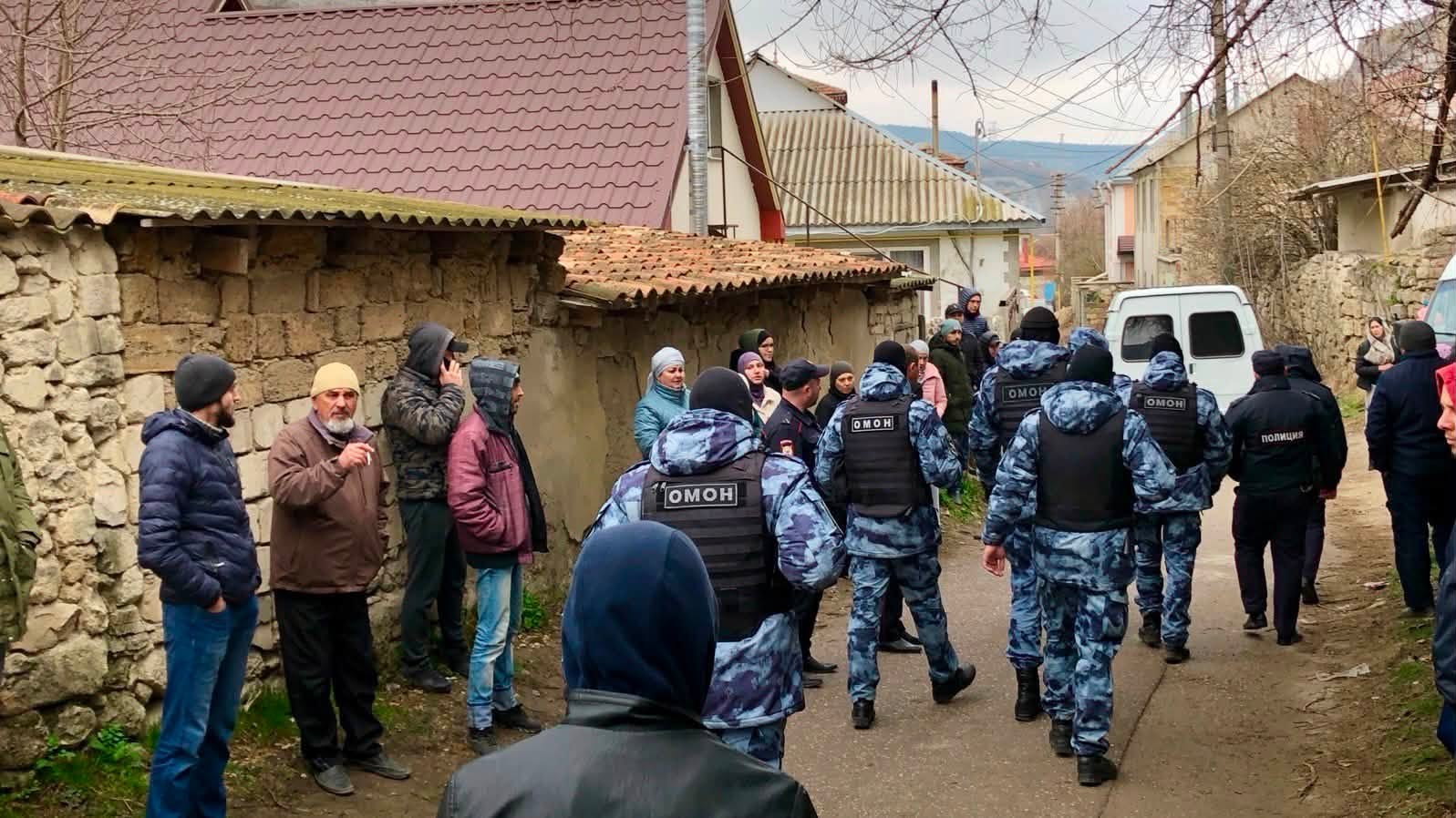 crimea's political prisoners lost lifeline—because keeping open have put more people prison · post russian police officers walk down street past local residents during search operation occupied crimea 752189434_1050160264183047_2115633659460214672_n ukraine