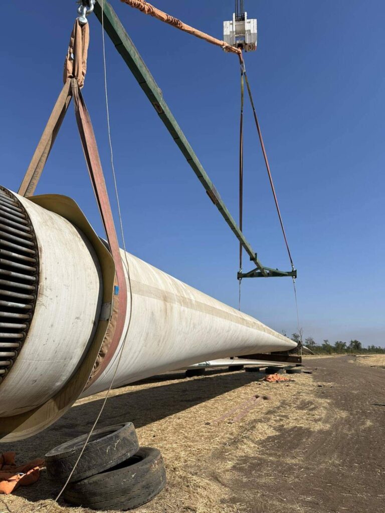 crane lifting a wind turbine into place
