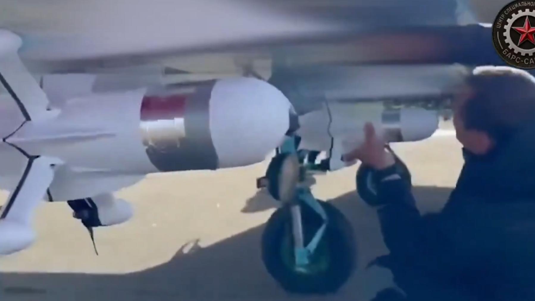 Arming a Russian gunship with interceptor drones.
