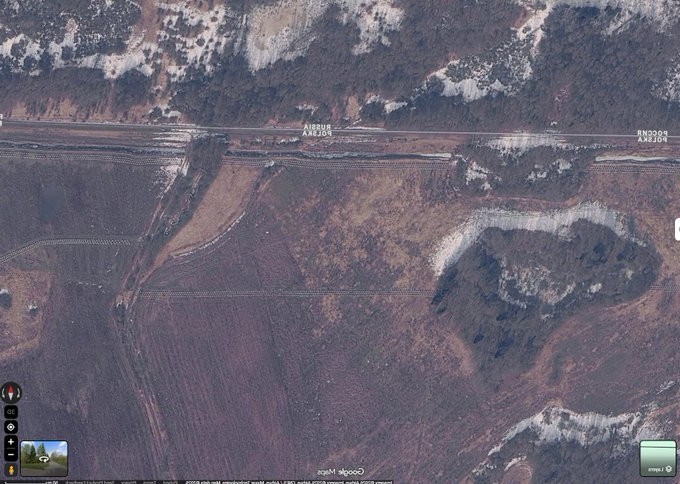 poland promised 700-kilometer shield against russia—two years satellites show four short ditches · post google maps satellite view poland's border fortifications near village rutka frontier russia's kaliningrad oblast sluzbyiobywatel ukraine